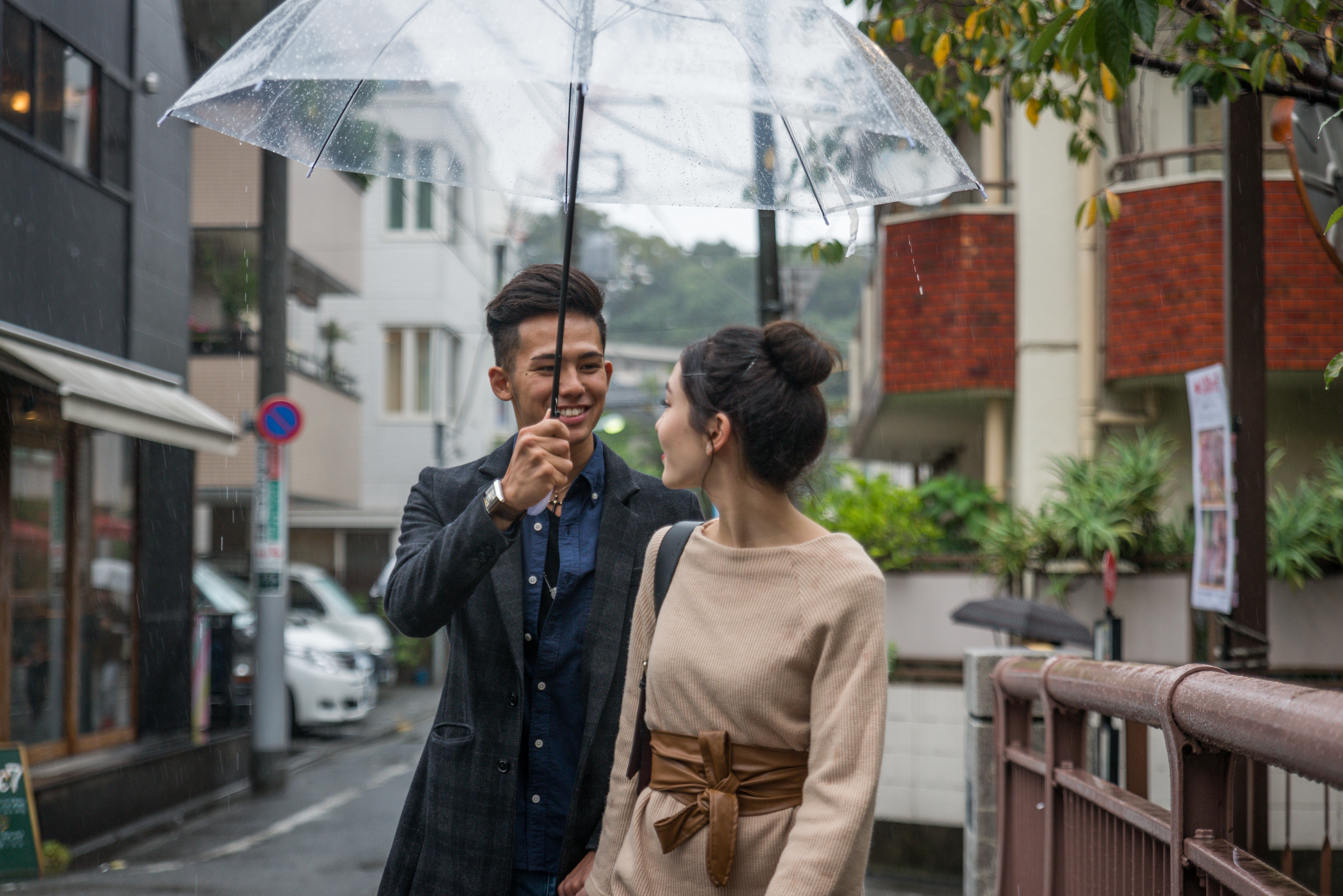 Happy japanese couple dating outdoors in Tokyo